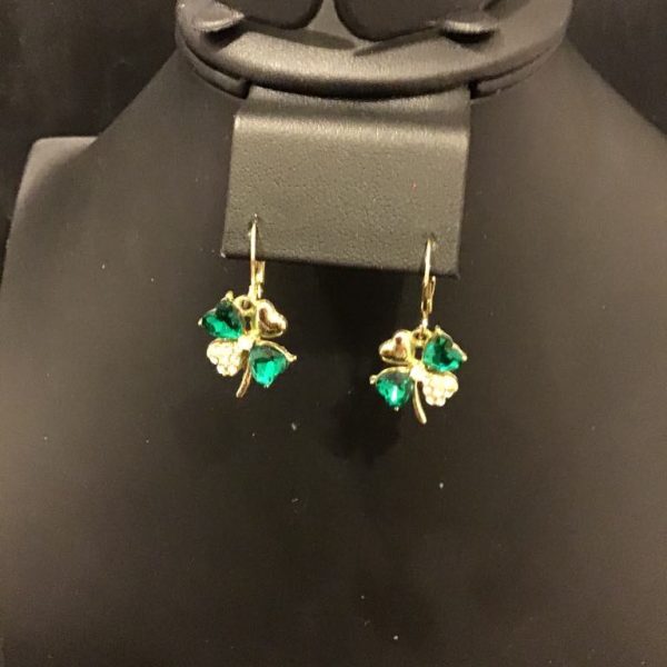 Elegant clover-shaped drop earrings with emerald-green stones and sparkling accents—perfect for adding vintage charm and a touch of luck to any outfit.