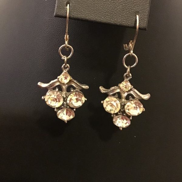 Elegant vintage-inspired earrings featuring sparkling faceted crystals in a delicate floral design, perfect for timeless glamour.